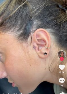 a woman with ear piercings on her ears