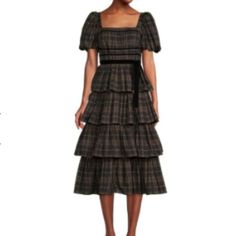 From Antonio Melani, This Dress Features: Plaid Taffeta Fabrication Square Neckline Short Puff Sleeves Tiered Skirt Velvet Self-Tie Sash At Waist Invisible Zipper/Hook & Eye Closure At Center Back Approx. 47" From Shoulder To Hem Length Polyester/Elastane Dry Clean Only Pit-Pit:40' Fall Midi-length Puff Sleeve Dress With Ruffles, Fall Puff Sleeve Midi Dress With Ruffles, Fall Midi Puff Sleeve Dress With Ruffles, Fitted Tiered Puff Sleeve Dress With Ruffles, Tiered Puff Sleeve Dress With Ruffles For Daywear, Fall Midi Dress With Ruffles And Square Neck, Chic Fitted Puff Sleeve Dress With Tiered Skirt, Daywear Puff Sleeve Dress With Tiered Skirt And Ruffles, Daywear Puff Sleeve Tiered Dress With Ruffles