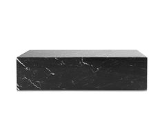 a black and white marble box on a white background