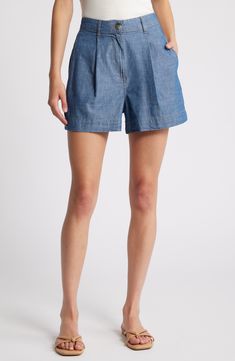 Soft pleats elevate the style of relaxed-fit, trouser-inspired shorts made from lightweight denim. Zip fly with button closure Front slant pockets 100% cotton Machine wash, line dry Imported Casual Jean Shorts For Spring, Spring Jean Shorts With Pockets, High-waist Denim Bermuda Shorts For Summer, High Waist Denim Bermuda Shorts For Summer, Spring Medium Wash Shorts With Pockets, Summer Denim Bermuda Shorts With Pockets, Spring Workwear Bermuda Shorts With Pockets, Denim Bermuda Shorts With Pockets For Summer, Casual Bermuda Shorts For Spring Workwear