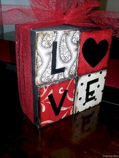 a red box with the word love painted on it