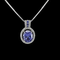 Stunning Tanzanite  Necklace, (Promotion Priced) AAA Lab Created Tanzanite  With Sparkling White Sapphire Accents 16 or 18 Inches .925 Sterling Silver Box Chain Included Pendant 0.8 Inches Long And 0.5 Inches Wide Wrapped & ready to give in a Laced Blue Gift Box included  Fast Free Shipping From South Florida Tanzanite Jewelry Top Tanzanite, Octopus Necklace, Tanzanite Necklace, Tanzanite Jewelry, Blue Gift, Silver Box, Pendant Design, White Sapphire, Box Chain