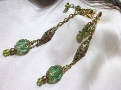 Hey, I found this really awesome Etsy listing at https://www.etsy.com/listing/184686209/hand-made-beautiful-filigree-chandelier Green Dangling Bead Chandelier Earrings, Green Czech Glass Jewelry With Dangling Beads, Green Beaded Chandelier Earrings For Wedding, Green Dangle Clip-on Earrings For Wedding, Green Jeweled Chandelier Earrings As Gift, Green Dangle Jewelry With Faceted Beads, Green Jeweled Chandelier Earrings For Gift, Green Crystal Drop Earrings With Dangling Beads, Green Faceted Earrings For Wedding