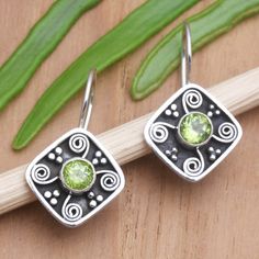 Accented with bright green gems Made Sugi's drop earrings provide a beautiful pop of color. Using sterling silver the Balinese artisan hand crafts the pair in a combination finish centering each earring with a faceted peridot stone. Hand Crafts, Peridot Stone, Sterling Silver Drop Earrings, Green Gems, Balinese, Hook Earrings, Bright Green, Stone Color, Natural Stones