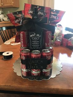 an arrangement of beer cans on a table