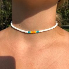 Cute, beachy choker to give you the best summer vibes! Customizable length and comes with a 2 inch extension chain! Bohemian Summer Jewelry With Letter Beads, Bohemian Summer Beaded Bracelets With Colorful Beads, Hippie White Beaded Jewelry, White Beaded Hippie Jewelry, Summer Festival Beaded Bracelets, Trendy Beaded Jewelry For Beach Season, Tiny Beaded Bracelets For Summer Vacation, Beaded Trendy Jewelry For Beach Season, White Bohemian Choker With Colorful Beads