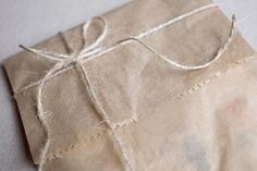 an old brown paper bag tied with twine