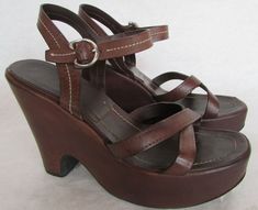 A very chic 4 1/2" wedge brown leather sandal from Prada. Very good condition. Left toe edge has a bit of a rough spot, very hard to see in person. Size 37 1/2 Eur. Us 7. 5 medium. Paypal Payments Only Please! When auction concludes payments must be made within 3 days. Immediate Payment Appreciated. “Buy It Now” items must be paid immediately.  If you have a broken item or feel the item was misrepresented  contact me within 24 hours. Return shipping will be paid by buyer. I am willing to discuss 1960s Sandals, 2000s Sandals, Wedge Sandals Outfit, 90s Sandals, Brown Platform Sandals, Witchy Outfits, 90s Shoes, Vintage Sandals, Cute Wedges