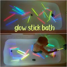 a child in a bathtub with glow sticks on the floor and below it, there is