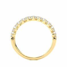 a yellow gold wedding band with white diamonds