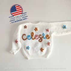 🌟 A Timeless Treasure: Hand-Embroidered Personalized Baby Sweater 🌟 Introducing our hand-embroidered personalized baby sweater, a timeless treasure that will warm your heart as much as it warms your little one. Made of the softest yarn and delicately personalized with your child's name, this sweater is more than just clothing--it's a symbol of love and a keepsake to be cherished for life. 🧶 Craftsmanship at Its Finest: Each sweater is meticulously hand-embroidered by our skilled artisans with Cream Letter Print Sweater For Winter, Cream Winter Sweater With Letter Print, Winter Cream Sweater With Letter Print, Playful Long Sleeve Sweater With Letter Print, Cute Letter Print Winter Sweater, Cute Winter Sweater With Letter Print, White Letter Embroidery Sweater For Winter, Long Sleeve Winter Birthday Sweatshirt, White Top For Birthday In Winter