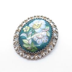 925 Sterling Silver Vintage Hand Painted Enamel Floral Pin Brooch Weight: 11.5g WELCOME TO PAWN SHOP We are an actual pawn shop and have been in business for over 25 years. Since 1990, our establishment has been serving a variety of clients by providing them with short term cash solutions and options of liquidity regarding their treasured heirlooms. Acknowledging that today′s customers are very sophisticated and are looking for a variety of investments, our acquisitions are hand-picked for our s Silver Enamel Brooch Pin, Silver Cabochon Brooches Collectible, Formal Silver Enamel Brooches, Vintage Enamel Brooches For Anniversary, Engraved Silver Oval Brooches, Vintage Silver Enamel Pin Collectible, Vintage Silver Collectible Enamel Pin, Silver Hallmarked Oval Brooches, Silver Hallmarked Oval Brooch