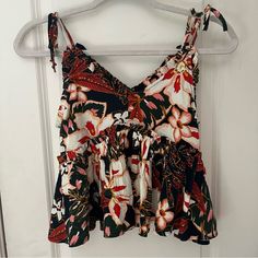 From Anthropologie I Think. By The Brand Patrons Of Peace, Size Small. New With Tags Never Worn. The Straps Can Be Tied To Adjust Length. Bohemian Cropped Tank Top, Feminine Tie-back Tank Top, Cotton Tie-back Top With Spaghetti Straps, Beach V-neck Tank Top With Tie Straps, Bohemian Floral Print Tank Top, Flowy Tank Tops, Anthropologie Top, Flowy Tank, Anthropologie