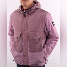 Nwt Size L Weekend Offender Garbrndt Hooded Jacket In Lilac Glow Fixed Hood With Adjustable Toggles Concealed Full Zip Closure Weekend Offender Branding On Sleeve Chest Pockets With Branded Stud Buttons Angled Side Pockets With Zip Closure Elasticated Cuff & Hem Internal Pocket Containing Matching Colour Facemask Dwr Coated (Durable Water Repellent) Made From 100% Nylon / Filling: 100% Polyester Hand Wash Only Purple Adjustable Hood Outerwear For Streetwear, Purple Outerwear With Adjustable Hood For Streetwear, Purple Streetwear Outerwear With Adjustable Hood, Urban Purple Outerwear With Pockets, Urban Purple Outerwear For Winter, Urban Purple Winter Outerwear, Purple Hooded Urban Outerwear, Urban Pink Outerwear With Pockets, Pink Urban Outerwear With Pockets