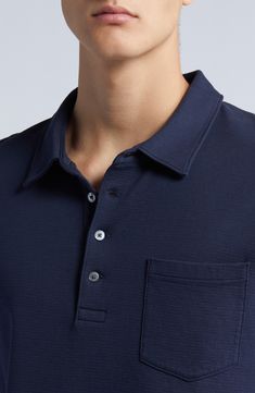 Classic and comfortable, this polo crafted from breathable cotton features a simple patch pocket and a relaxed feel that's perfect for any casual look. 27" length (size Medium) Button half-placket Spread collar Short sleeves Chest patch pocket 100% cotton Machine wash, tumble dry Imported Cotton Tops With Welt Pockets And Collared Neckline, Classic Blue Polo Shirt With Pockets, Summer Casual Polo Shirt With Pockets, Navy Cotton Tops With Welt Pockets, Classic Tops With Collared Neckline And Welt Pockets, Modern Collared Polo Shirt For Business Casual, Navy Polo Collar Top With Pockets, Navy Casual Polo Shirt For Golf, Relaxed Fit Polo Shirt With Spread Collar For Work