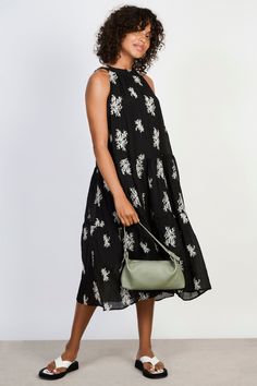 Black embroidered floral tie neck dress Spring Floral Print Embroidered Knee-length Dress, Floral Embroidery Midi Dress For Day Out, Floral Embroidered Midi Dress For Day Out, Sleeveless Midi Dress With Floral Embroidery For Daywear, Floral Embroidered Midi Dress For Spring Day Out, Sleeveless Floral Embroidery Midi Dress For Daywear, Spring Floral Embroidered Midi Dress For Day Out, Midi Dress With Floral Embroidery For Day Out, Spring Floral Embroidery Midi Dress For Day Out