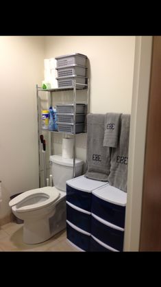 the bathroom is clean and ready to be used as a storage area for toiletries