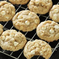 white chocolate chip cookies cooling on a wire rack in the oven, ready to be eaten