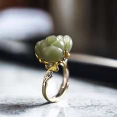 Elevate your style with our stunning silver ring featuring a vibrant jade flower. Handcrafted with meticulous attention to detail, this nature-inspired piece exudes elegance and uniqueness. Jade is revered for its healing properties, believed to bring balance and harmony to the wearer, promoting peace and prosperity. Whether you're treating yourself or searching for the perfect gift, this statement jewelry piece is sure to dazzle while imparting the soothing energy of jade. Add a touch of nature Luxury Jade Wedding Ring, Nature-inspired Flower Gemstone Jewelry, Spiritual Jade Jewelry For Weddings, Elegant Flower Shaped Jade Jewelry, Green Flower-shaped Jewelry For Anniversary, Green Flower-shaped Anniversary Jewelry, Green Flower Shaped Anniversary Jewelry, Green Gemstone Flower-shaped Jewelry, Green Gemstone Flower Shaped Jewelry