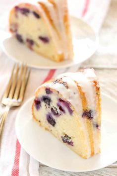 two slices of blueberry bunt cake on white plates