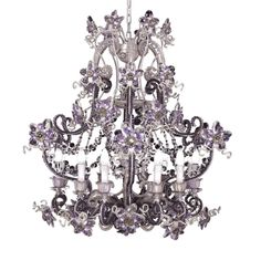 an ornate chandelier with purple crystals