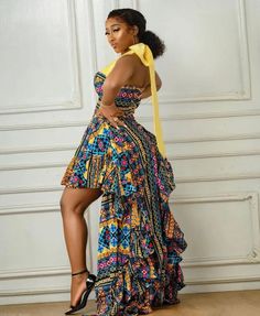 This beautifully made African print dress will make you look stunning and standout in that your forthcoming occasion. ABOUT SIZING: *  Comes in different sizes.  * For more perfect fit, please use the measurement guide/sample to measure and send us the following: @Bust @Waist @Hip  @Dress length  Kindly let us know how tall you are to enable us determine a perfect dress length for you. ORDERING PROCESS: * Please swipe left of the product/outfit picture to see pictures of available fabrics in num Yellow Printed Maxi Dress For Party, Fitted Multicolor Ruffled Maxi Dress, Multicolor Long Ruffled Dress, Multicolor Fitted Sleeveless Gown, Ankara High Low Dress, African Birthday Dress, Showstopper Dress, Unique Ankara Styles, African Print Dress Ankara