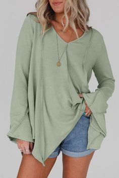 This stylish top is the perfect addition to any wardrobe. Made from 95%Polyester+5%Elastane, it ensures a durable and wrinkle-resistant wear. Whether you're dressing up for a night out or keeping it casual for a day at the office, this top is versatile enough to suit any occasion. Features: • Green Color: The green color is vibrant and adds a touch of elegance. • Unique Design: The unique design of this product makes it a standout piece. • High-Quality Material: Made from 95%Polyester+5%Elast... Casual Long Sleeve V-neck Top In Solid Color, Spring V-neck Long Sleeve Loungewear Top, Stretch Solid Color V-neck Top, Versatile V-neck Tops For Winter, Stretch Long Sleeve Solid Color Knit Top, Stretch V-neck Knit Top In Solid Color, Stretch V-neck Solid Color Knit Top, Green Non-stretch Solid Color Tops, Solid Color V-neck Tops For Layering