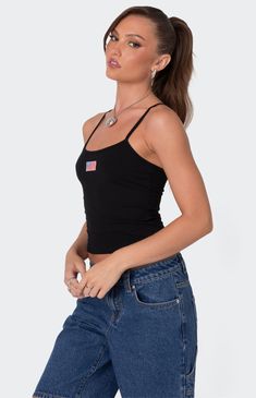 Online only! Feel like the ultimate American babe in this cute Edikted USA Tank Top. Pair this tank with any bottoms you like for the coolest effortless look. 


	Tank top
	Adjustable straps
	Embroidered patch
	Cotton, Spandex
	Model wears size S
	Model height is 5'8
	Item care: Machine wash at maximum 30C, do not bleach, tumble dry low, iron at a maximum of 110C, do not dry clean. Casual Summer Tank Top With Straps, Casual Tank Strap Crop Top For Everyday, Casual Everyday Crop Top With Tank Straps, Casual Tank Straps Crop Top For Everyday, Casual Crop Top Tank With Adjustable Straps, Casual Summer Tops With Straps, Basic Cotton Tank Top With Adjustable Straps, Casual Black Tops With Straps, Casual Everyday Crop Top Camisole