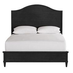 a bed with white sheets and pillows on it's headboard, against a white background