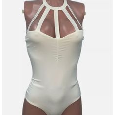 Sexy Winter White Cut Out Bodysuit Top Nwt S Stretchy Fitted Clubbing Holiday Poly/Spandex. Stretch Halter Neck Bodysuit With Cutout, Fitted Halter Neck Bodysuit With Cutout, Sleeveless Club Bodysuit With Lined Body, Sleeveless Bodysuit With Lined Body For Club, Sleeveless Lined Bodysuit For Club, Sleeveless Lined Body Leotard For Party, Chic One-piece Lined Body Leotard, Chic One-piece Leotard With Lined Body, Chic One-piece Lined Leotard