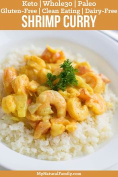 shrimp curry on top of rice in a white bowl