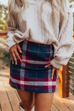 - Bring on plaid season with this adorable mini skirt! Perfect for everything from everyday outings to brunches with friends, this chic piece brings charming energy to your OOTD. - Warm, fully lined material with a plaid print - An elastic waistband - Side zip closure - A flattering silhouette that ends in a straight mini skirt length hemline Denim Trench Coat, Concert Fashion, Faux Leather Purse, Sweater Jumpsuit, Essential Dress, Teacher Style, Knee High Leather Boots, Plaid Skirt, Curve Dresses