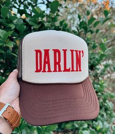 ✨Darlin' Trucker Hat✨ Howdy Darlin!  Tan and brown trucker hat with red puff print vinyl.  One size fits most!  Foam front panel with mesh back and adjustable strap.  No returns, please.  Feel free to reach out with any questions! Stay groovy! Brown Trucker Hat, Cute Trucker Hat, Trucker Hat Outfit, Stay Groovy, Hat Western, Women Trucker, Western Gifts, Puff Print, Outfits With Hats