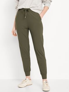 High-Waisted SleekTech Jogger Pants for Women | Old Navy Solid Elastane Sportswear Bottoms, Stretch Sports Joggers With Pull-on Style, Solid 4-way Stretch Bottoms For Jogging, Solid Activewear With Elastic Waistband For Jogging, Solid Color Activewear With Drawstring Long Pants, Solid Color Long Pants Activewear With Drawstring, Comfort Stretch Sportswear Pants With Elastic Waistband, Athleisure Bottoms With Comfort Stretch, 4-way Stretch Bottoms With Pockets For Jogging