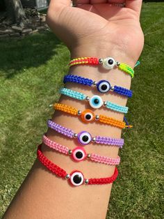 Adjustable evil eye bracelet. Available in 9 colors (price per bracelet) Trendy Adjustable Evil Eye Friendship Bracelets, Trendy Adjustable Multicolor Evil Eye Bracelet, Trendy Resizable Evil Eye Bracelet, Multicolor Evil Eye Round Bracelets, Multicolor Round Evil Eye Bracelets, Casual Evil Eye Bracelets, Adjustable Evil Eye Friendship Bracelets, Adjustable Round Evil Eye Bracelet, Multicolor Evil Eye Bracelets