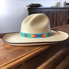 Handmade Beaded hatband tie!Sparkly seed beads where used to create this beautiful cow boy hat accessory. Handwoven Hat Bands For Rodeo With Flat Brim, Adjustable Multicolor Hat For Western-themed Events, Southern Style Adjustable Hat Bands For Ranch, Southern Style Adjustable Straw Hat For Ranch, Western Handwoven Hat Bands For Rodeo, Adjustable Handwoven Sun Hat For Rodeo, Adjustable Southern Style Hat Bands For Country Events, Handmade Traditional Hat Band For Western-themed Events, Western Style Multicolor Wide Brim Straw Hat