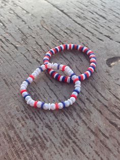 USA bracelet!! Make sure to put your size in the personalization ❤️🤍💙 White Adjustable Flexible Bracelets, Adjustable White Flexible Bracelets, Adjustable Flexible White Bracelets, White Flexible Bracelets As A Gift, Flexible White Bangle Bracelet, Usa Bracelet, Cloud Bracelet, Make Sure, Beaded Jewelry