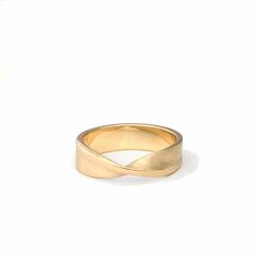 Who doesn't love a simple mobius strip, its a great simple change from a streamline band.  The one pictured here is made of solid 14k yellow gold but can be made in other karats, colors and nickle free options, feel free to convo me for a quote. This ring measures 6mm wide by 1.5mm thick.  It is pictured with a brushed finish with a polished edge but is also available in an all polished or all brushed.  This ring will be hallmarked.I can make this ring in full, half and quarter sizes as, just le Mobius Strip Ring, Brushed Gold Ring, Mobius Strip, Mobius Ring, Minimalist Wedding Rings, Gold Color Combination, Ring Bands, Hinged Ring, Ringe Gold