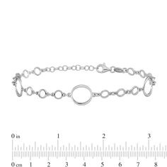 Add a little drama with this polished circle link bracelet. Hollow sterling silver Open circle links - three smaller and one larger - create the repeating pattern 4.7mm width 6.0 inches with 1.0-inch extender; lobster claw clasp Modern Sterling Silver Bracelets With Rolo Chain, Classic Round Chain Bracelet With Extender, White Gold Rolo Chain Bracelet, White Gold Round Rolo Chain Bracelet, Modern Round Bracelets With Adjustable Chain, Adjustable Sterling Silver Bracelet With Lobster Clasp, Modern Round Chain Bracelet With Polished Finish, Modern Polished Chain Bracelet, Hypoallergenic White Gold Charm Bracelet