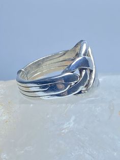 "Puzzle ring 4 band wedding sterling silver women men Size 6.25 Weight 6.3g Widest part of band 1/2\" Thinnest part of band. 3/16\" Free Shipping & Free Postal Insurance Delivered in a Gift Box If you do not want the ring polished and want to leave the natural patina please let me know at the time of purchase as I do polish rings before I ship rings out. Thanks Free First Class shipping and postal insurance is included. If you want to upgrade to priority kindly pay an additional fee to do so Silver Stackable Open Band Rings, Adjustable Open Band Hallmarked Stackable Rings, Adjustable Stackable Silver Bands, Adjustable Silver Stackable Rings With Thick Band, Adjustable Silver Stackable Wide Band Ring, Classic Silver Band Ring, Silver Stackable Wide Band Ring For Anniversary, Silver Stackable Jewelry With Thick Band, Adjustable Hallmarked Silver Stackable Rings