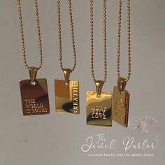 Gold-filled rectangular pendant Inspirational quote engraved on the front Pendant measures 20mm 16" ball chain with 3" extension and lobster clasp closure Stainless steel plated in 18K gold, hypoallergenic and tarnish-free 4 designs available Stainless Steel Plate, Love Each Other, Zodiac Necklaces, Cool Necklaces, Steel Plate, Ball Chain, Tag Necklace, Snake Chain, Inspirational Quote