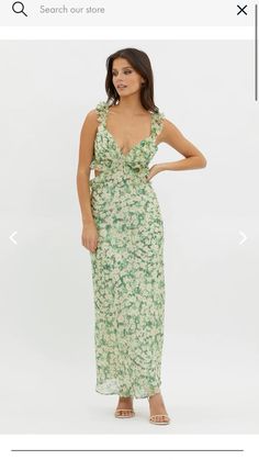 a woman wearing a green dress with flowers on it and the words, search our store