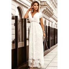 Limited Edition! Make A Statement In This Stunning Boho White Lace Bridal V-Neck Maxi Dress From Ditzys Boutique. Made From High-Quality Polyester And Featuring A Solid Pattern With Short Sleeves, This Dress Is Perfect For Any Occasion. The Elegant V-Neckline And Long Dress Length Provide A Touch Of Sophistication, While The Lace Fabric Adds A Bohemian Vibe. Whether You're Attending A Wedding, Holy Communion, Party, Or Just A Casual Day Out, This Dress Will Make You Feel Confident And Stylish. I White V-neck Short Sleeve Party Dress, Elegant V-neck Maxi Dress With Lace Trim, Elegant Lace V-neck Maxi Dress, Elegant V-neck Lace Maxi Dress, White V-neck Maxi Dress With Lace Trim, White V-neck Fitted Maxi Dress, Feminine V-neck Maxi Dress For Wedding, V-neck Maxi Dress With Lace Trim, White V-neck Party Dress With Short Sleeves