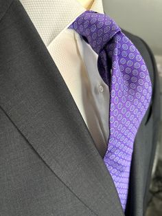 A beautiful light weight silk twill tie, perfect for those spring summer events on weekends and those special business meetings. The light purple or lavender color exudes luxurious and sophisticated elegance with any suit or jacket. Put this tie with a white shirt and navy blue blazer for a timeless look. Tailored Purple Suit For Business, Tailored Purple Business Suit, Elegant Lavender Standard Tie For Suit, Elegant Lavender Ties For Formal Occasions, Semi-formal Fitted Purple Suit And Tie Accessories, Formal Lavender Fitted Suit And Tie Accessories, Elegant Lavender Tie For Black Tie Events, Elegant Lavender Ties For Black Tie Events, Classic Purple Suit And Tie Accessories For Wedding