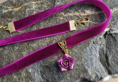 "Velvet ribbon choker with sculpted rose. Material of rose is polymer clay. Each petal of flower made by hand Dia flower about 13-15 mm/0.45- 0.55 \" Length of necklace is adjustable:  10-12 inches/ 25,4 - 30,5 cm 11-13 inches/ 28-33 cm 12-14 inches/ 30.5- 35.5 cm 13-15 inches/ 33-38 cm 14-16 inches/ 35.5 cm-40.5 cm 15-17 inches/ 38,1 cm- 43,2 cm 16-18 inches/ 40.6 cm- 45.7 cm 17-19 inches/ 43 cm - 48 cm 18-20 inches/ 45,5- 50.8 cm      Τhe length you choose considered to be with lobster clasp and one connecting ring +2 inches extended chain. Width of ribbon 10 mm / 0.4 inch If you need other length of necklace let me know and I will make it for you. Polymer clay isn't afraid of water, strong and non-toxic. Gorgeous gift for women and girls as handmade item ALL CHOKERS - https://www.etsy.c Rose Design Choker Necklace, Adjustable Rose Choker Necklace, Gift Rose Design Choker In Rose Color, Adjustable Ribbon Choker Necklace, Adjustable Choker Necklace With Ribbon, Adjustable Rose Design Choker Necklace, Rose Design Choker As Gift, Purple Choker Necklace For Gift, Elegant Pink Choker As Gift