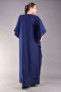 "Beautiful chic caftan in navy blue colour. The model's loose fit cut with kimono sleeves and the gathered bust area hide the flaws and flatter the top part of the body. The blue maxi dress is a top choice for plus size women who want to look elegant and stylish no matter of their size. Match it with flats for a more casual look or with heels for an evening occasion. ^ Sizes: The item can be made in sizes from XXS to 7XL. Please, use the size chart below or if you are not sure about your size, j Blue Tunic With Kimono Sleeves, Elegant Blue Tunic Maxi Dress, Blue Kaftan With Kimono Sleeves, Blue Long Thobe For Beach, Elegant Blue Beach Tunic, Blue Maxi Length Abaya For The Beach, Blue Tunic Abaya For The Beach, Blue Tunic Abaya For Beach, Blue Long Abaya For The Beach