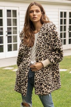 You will be the coziest girl around when you layer up with our adorable leopard print open jacket featuring ultra warm sherpa material. One Size Fits Most 100% Polyester Winter Leopard Print Faux Fur Outerwear, Hooded Leopard Print Winter Outerwear, Trendy Leopard Print Winter Outerwear, Cozy Long Sleeve Outerwear In Leopard Print, Cozy Long Sleeve Leopard Print Outerwear, Winter Leopard Print Outerwear With Faux Fur Trim, Oversized Leopard Print Long Sleeve Outerwear, Hooded Leopard Print Outerwear For Fall, Winter Leopard Print Outerwear With Pockets