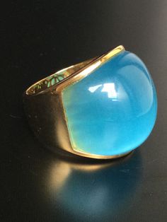 This is a perfect and unique magic  ring made of blue cat eye stone, gold 18K, the powerof the ring is used as a talisman for protection against misfortunes and various disasters. Used in conjunction with meditation to make contact with the mind.  The ring showcases an elegant design with rare style amulet ring. It is great to get this ring for your loved one or treat yourself for a classic timeless style.  Brief Story: It is a crystal in the quartz group. It can be called many names, cat's eye Formal Blue Chalcedony Ring, Amulet Ring, Stone Magic, Cat Eye Stone, Blue Cat Eye, Thai Buddha, Cats Eye Stone, Timeless Classic Style, Magic Ring