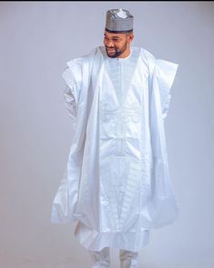 Step into the world of African tradition and sophistication with our exquisite Agbada African attire, a garment that embodies the rich heritage and artistry of African culture. This versatile attire is perfect for a wide range of special occasions and celebrations, where it adds an aura of regal elegance to your presence. Product Information: Complete Ensemble: The Agbada comes as a complete set, including a matching shirt and pants, allowing you to effortlessly achieve a cohesive and stylish lo Elegant Sets For Eid And Traditional Ceremonies, Elegant Dabka Embellished Thobe With Traditional Drape, Elegant Formal Kurta With Traditional Patterns, Formal Festive Thobe With Dabka Detailing, Festive Formal Thobe With Dabka, Festive Formal Thobe With Dabka Detailing, Elegant Fitted Thobe For Traditional Ceremonies, Elegant Agbada For Eid And Traditional Ceremonies, Elegant Thobe For Eid And Traditional Ceremonies