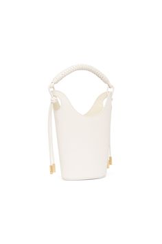 Louise Leather Bucket Bag | Ivory | Aje – Aje ROW Modern Crossbody Bucket Bag With Braided Handles, Chic Crossbody Bucket Bag With Braided Handles, Chic Bucket Bag With Adjustable Strap And Round Handle, Modern Bucket Bag With Braided Handles, Leather Bags With Braided Handles In Bucket Shape, White Dress Spring, Jumper Denim, Chic Leather, Knit Jumpsuit